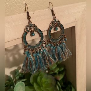 Beautiful dangly copper earrings with multi colored tassels!
